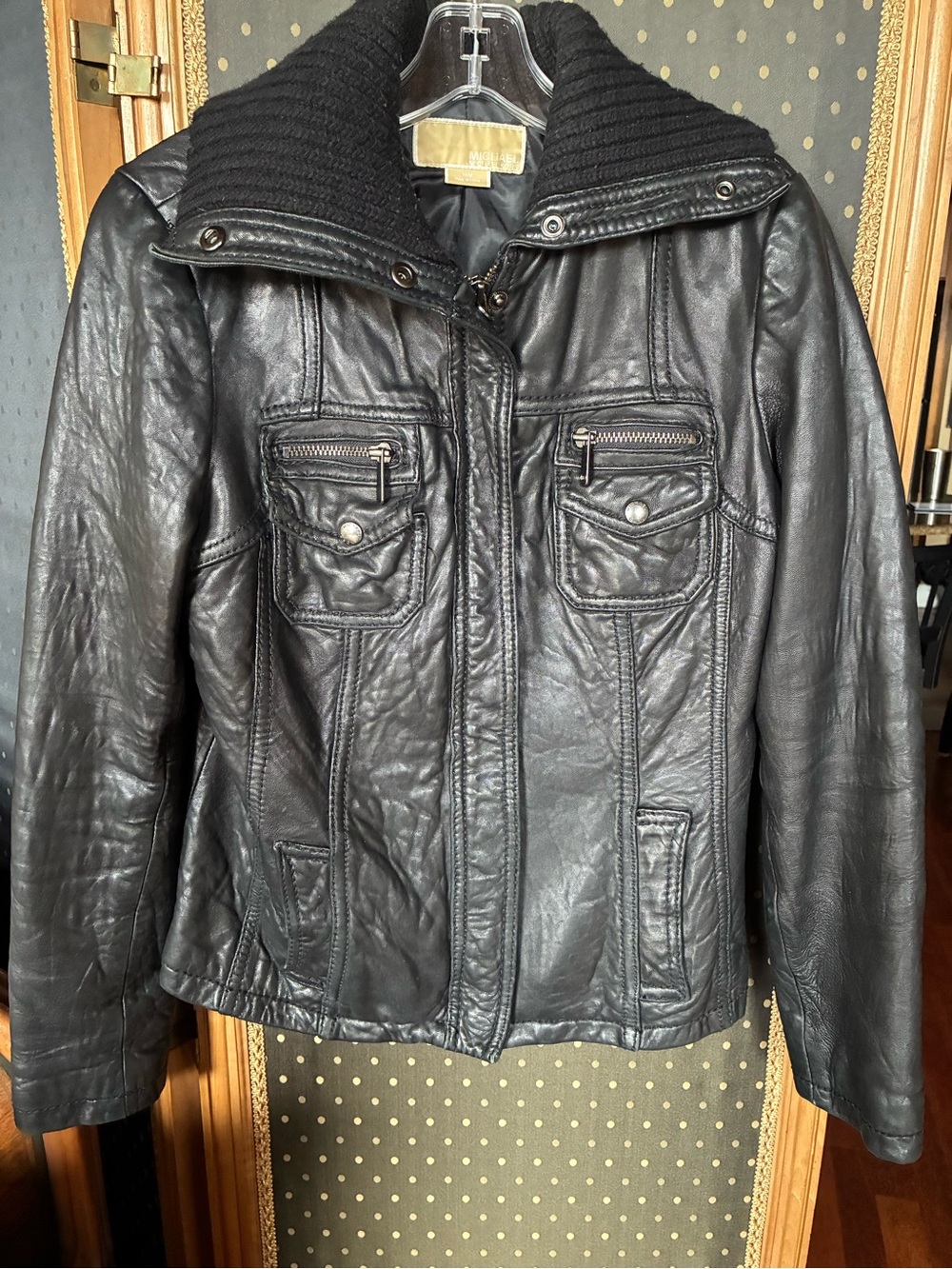 Ladies black leather jacket with knitted collar